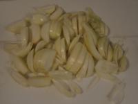 Peel the onion, cut into the halves and then into...