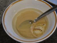 In a bowl mix mustard with oil....