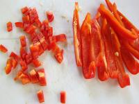 Core and clean red pepper, wash it and cut into...