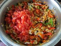 Wash tomatoes and cut them into small cubes. Mix...