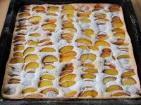 Sprinkle the cooled cake with sifted powdered...