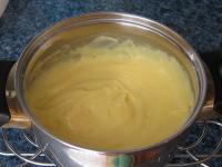 Cook a thick custard from milk, sugar and custard...