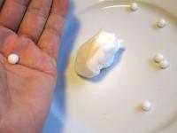 From fondant form the small balls in a palms......