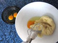 Gradually stir eggs in the cold dough....