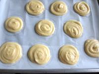 Fill circles on paper with the dough, but leave...