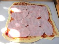 Place half of the measured ham. ...