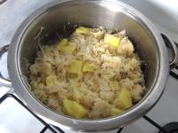 Add cabbage to the potatoes, stir and braise...