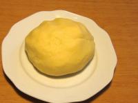 Knead the dough, put it in a plastic bag and allow...