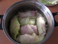 Place rolls on the cabbage. Spread the second half...