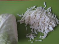 Cut the cabbage into small pieces. ...