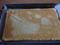 Turn the cake base over and prick with skewer...