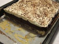 Sprinkle with cocoa powder, cut off the edges (not...