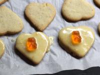 Soak the hearts from one side in the icing. You...