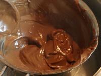 Melt chocolate over a water bath. ...