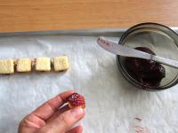 Join always two squares with jam and place closely...