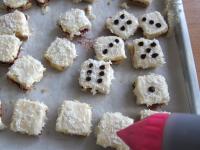 Melt the chocolate and with confectionery...