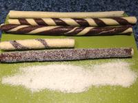 Coat prepared cylinders with coconut. Let it...