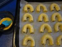 Beat the egg yolks with water and brush the...
