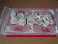 Cut cheese and place it on the meat. ...