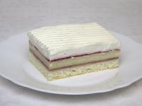 Cut the dessert and decorate it with raspberry...