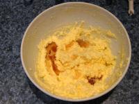 Mix butter with pudding and stir rum in....