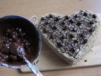 Melt chocolate and decorate the cake. We can add...