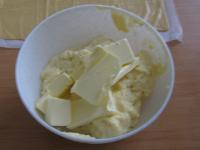 Add sliced butter into warmish pudding gruel and...