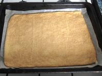 Transfer the layers with parchment paper to the...