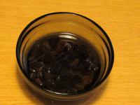 Place raisins in rum and allow them to soak for 24...