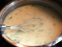 Remove the soup from the heat and stir in a sour...