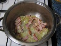 Peel onion, chop it and add to the lard. Cook it...