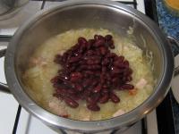 Add strained canned beans and stir....