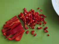 Wash pepper, remove the seeds and cut it into...