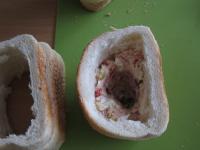 Place bread crusts on top of each other, put...