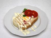 Lay tomatoes on the sandwiches and pour them over...