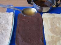 Remove parchment paper from the baked warm...