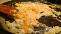 When the meat is rested, prepare runny scrambled...