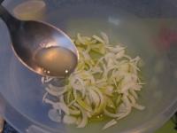 In a bowl separate onion and blend with oil and...
