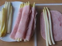 Pack three pieces of asparagus in ham. ...