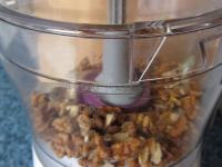 Chop the nuts. Put a small part of nuts and...
