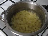 Brush potatoes, cut into a smaller cubes and put...