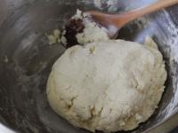 Add two cups of flour to the bowl. Heat almost to...