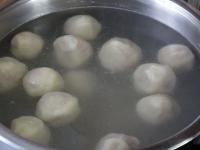 Bring water in a big pot to a very gentle boil and...