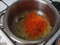 Peel carrot, wash it and grate. Add it to onion...