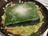 Add a frozen cube of spinach to the onion and...