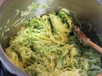 Finely grate zucchini and cook it in oil. Pour it...