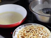 Pour a dough onto a hot pan and help it to...