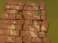 Spread toast bread from one side with butter and...