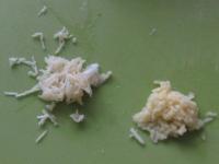 Peel the garlic and ginger and grate both....