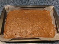 Spread the dough evenly on a smaller baking sheet...